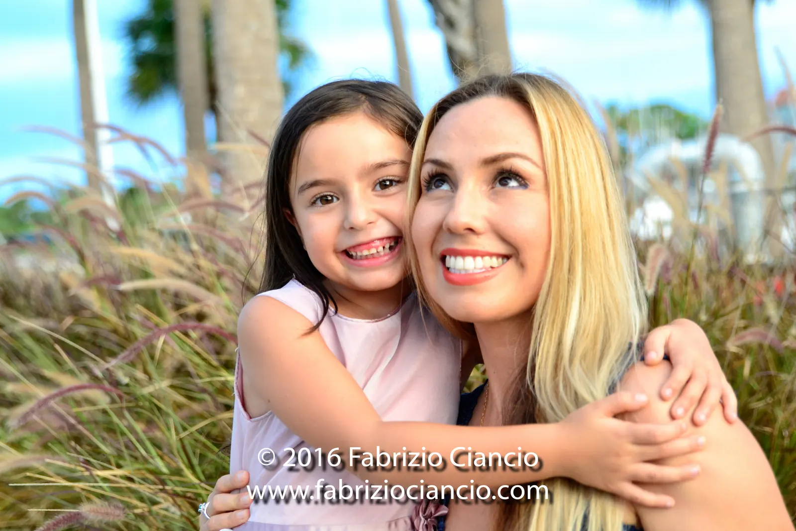 Mother and child smiling together